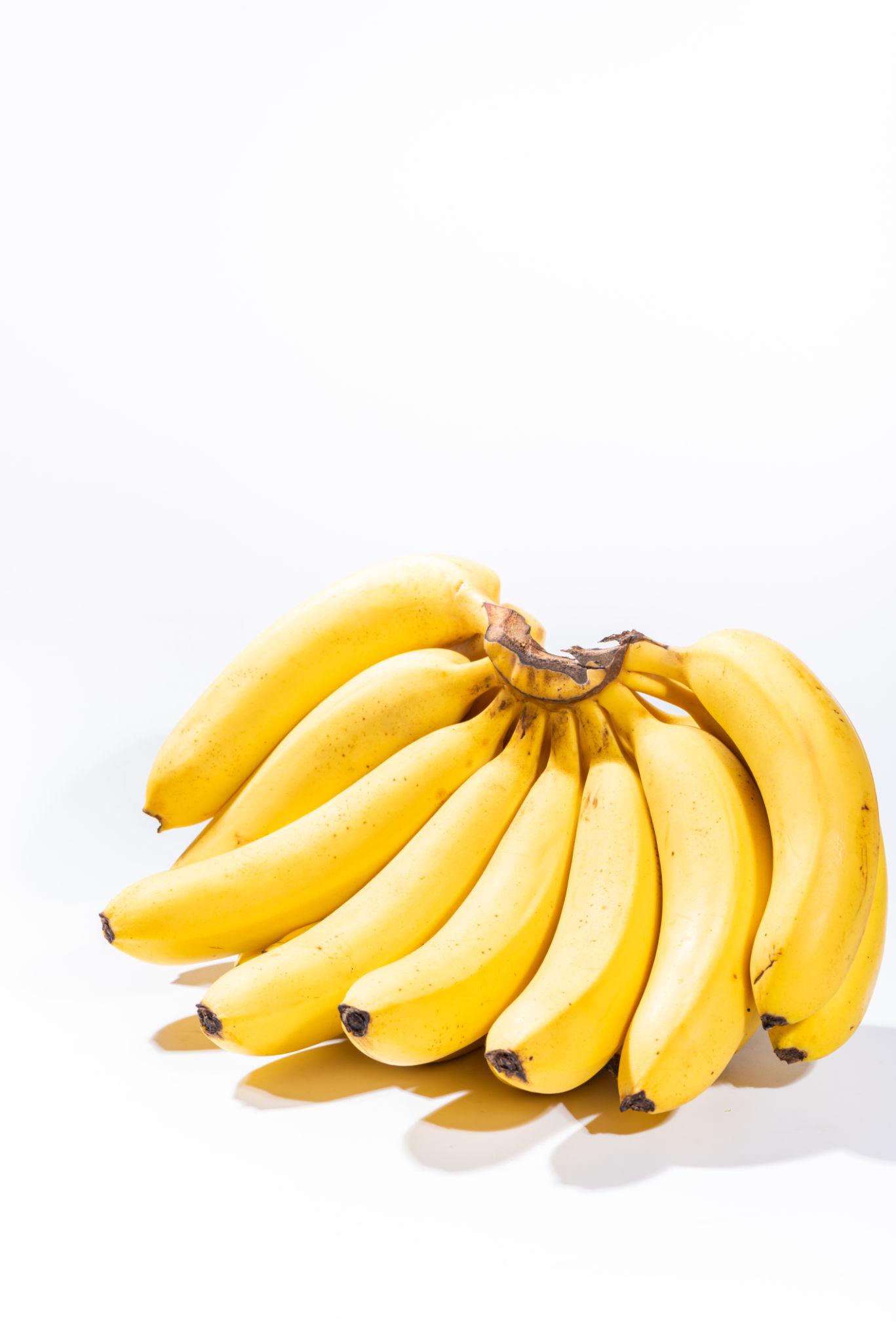 Fresh ripe bananas showing nutrition facts and health benefits